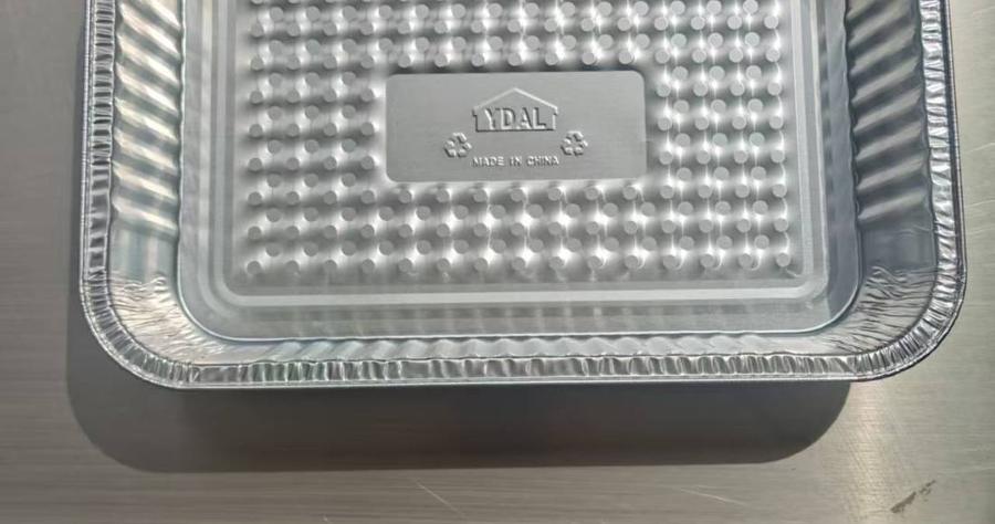 Deep aluminum roasting pan with embossed YDAL factory branding